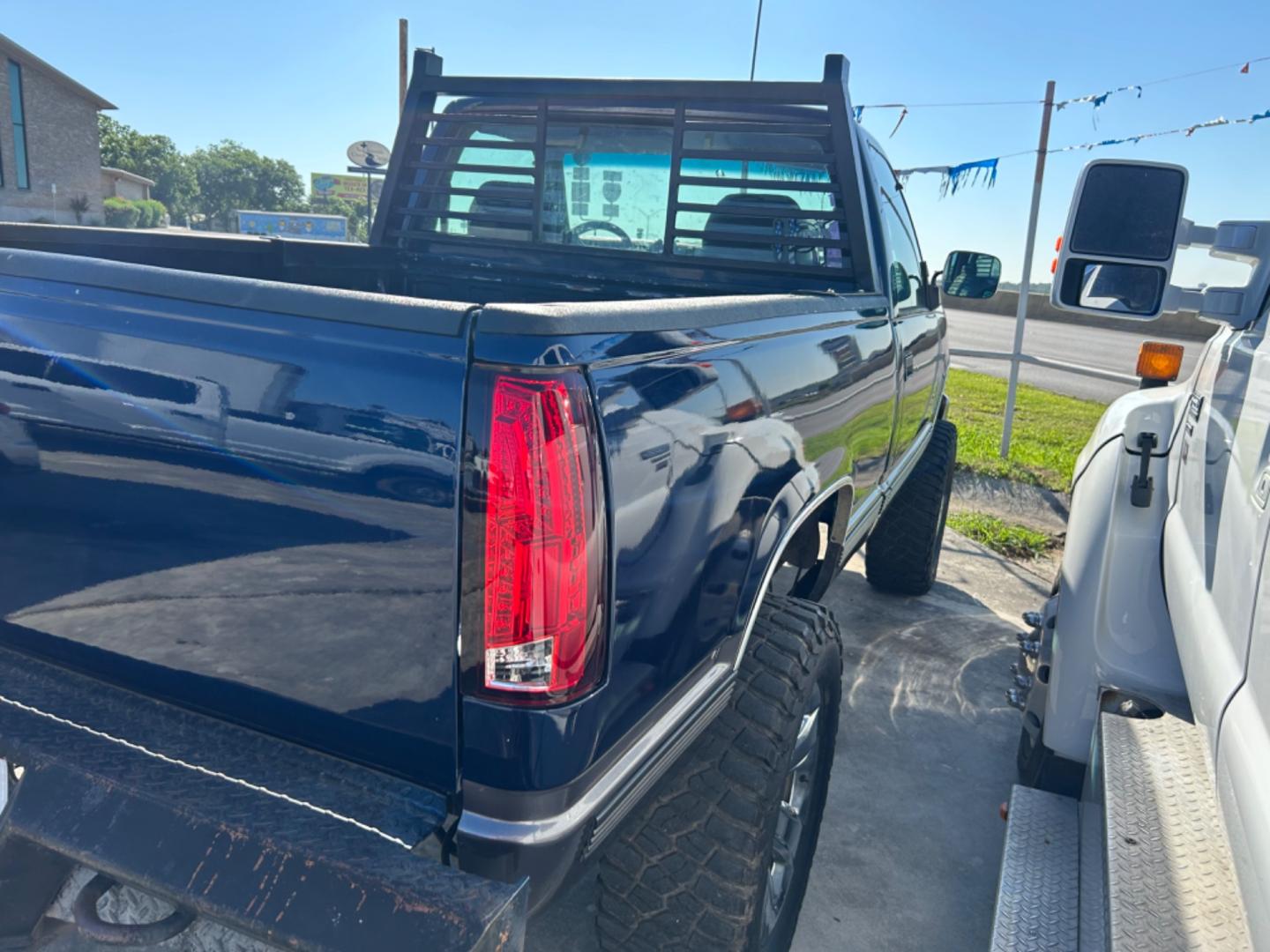 1995 Blue Chevrolet C/K 1500 Reg. Cab 6.5-ft. Bed 4WD (1GCEK14K9SZ) with an 5.7L V8 OHV 16V engine, located at 1687 Business 35 S, New Braunfels, TX, 78130, (830) 625-7159, 29.655487, -98.051491 - Photo#2